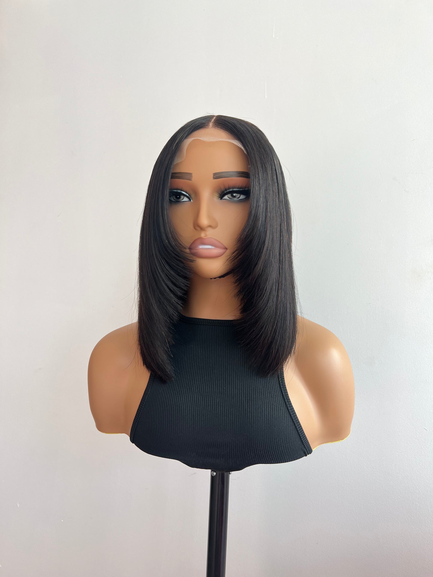 
                  
                    12” 5x5 Black Straight Transparent Lace Closure Human Hair Wig
                  
                